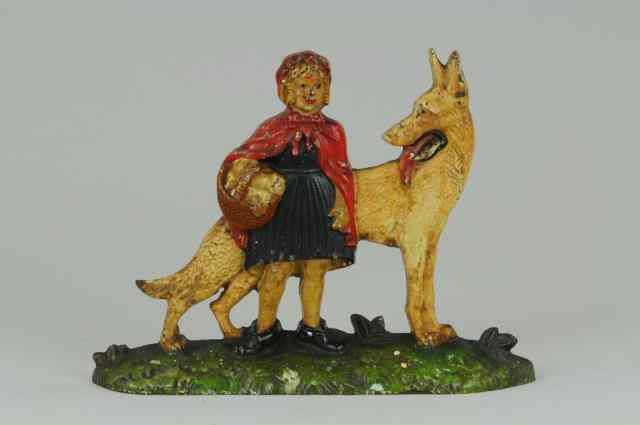 Appraisal: RED RIDING HOOD WITH WOLF DOORSTOP NYUDEA cast iron fairy