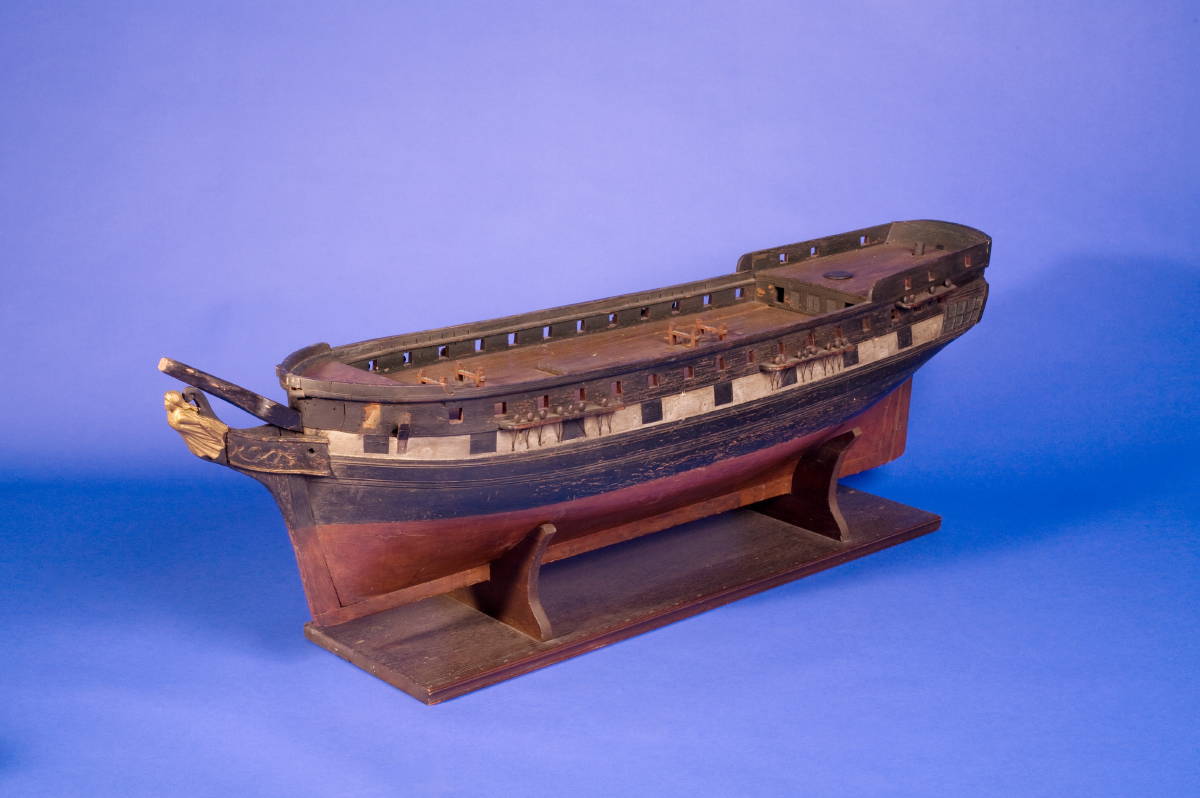 Appraisal: EARLY NINETEENTH CENTURY CARVED AND PAINTED MODEL OF THE HULL