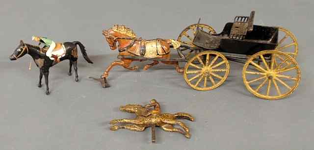 Appraisal: Cast iron toy horse and wagon h x l a