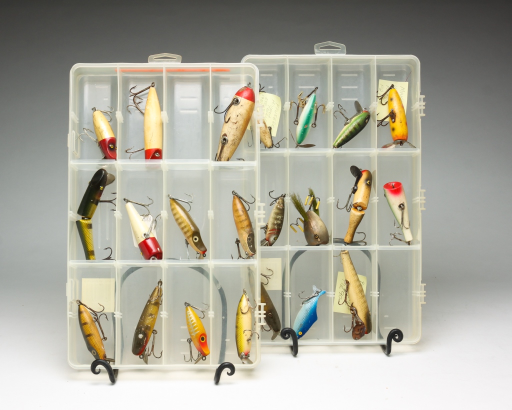 Appraisal: TWENTY-ONE FISHING LURES INCLUDING WOOD American th century Including Paw