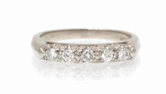 Appraisal: A Karat White Gold and Diamond Band containing five round