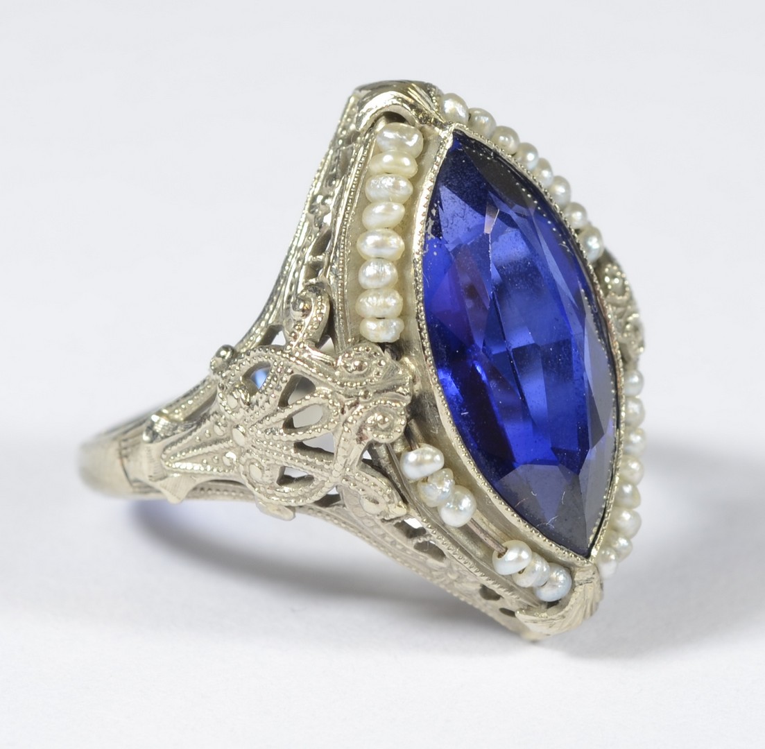 Appraisal: K WG filigree ring w marquis cut synthetic blue sapphire