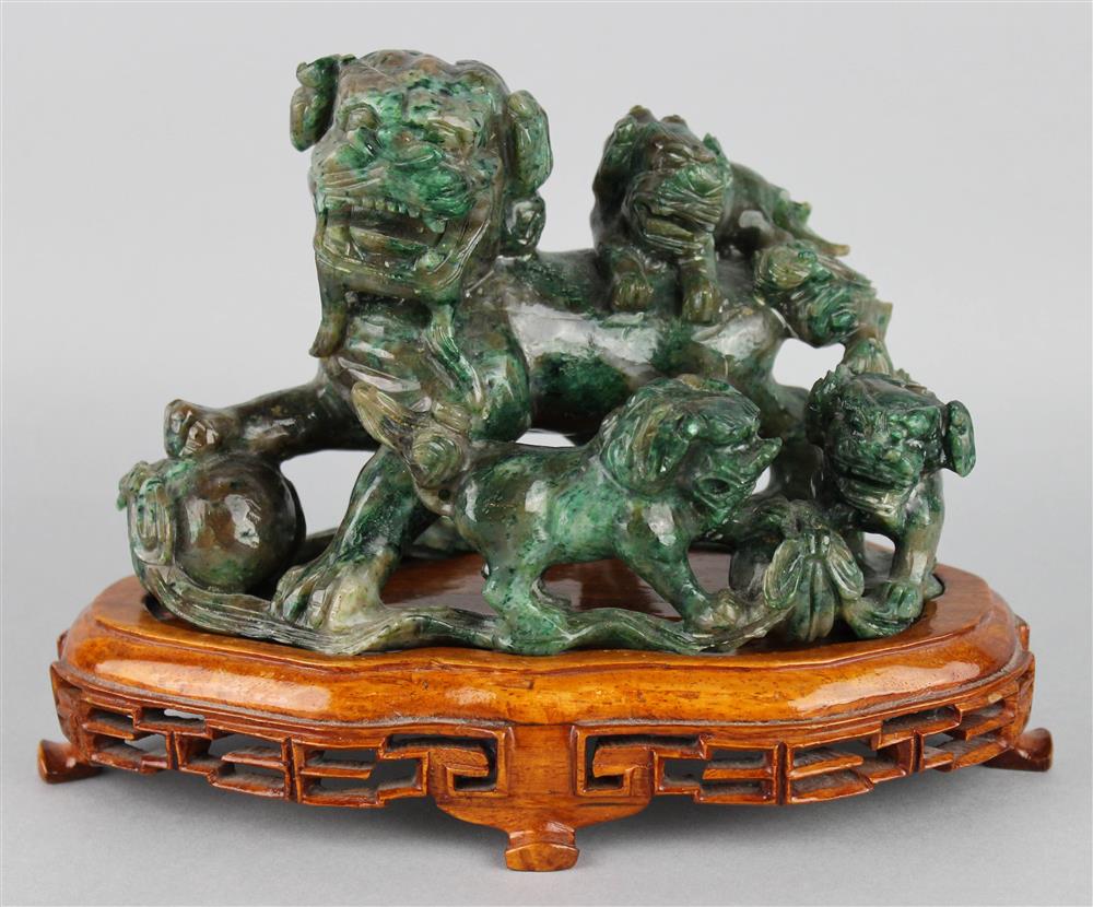 Appraisal: CHINESE AGATE BUDDHISTIC LION AND CUBS carved as a female