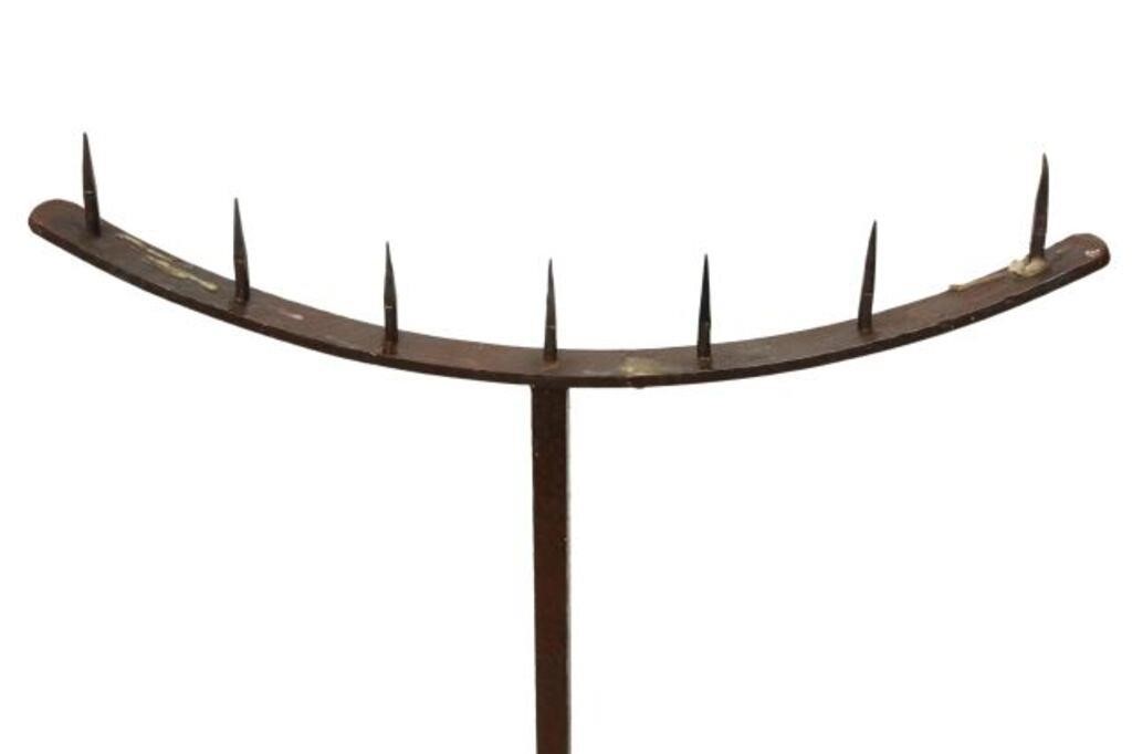 Appraisal: Spanish wrought iron candle pricket seven candle spikes on a