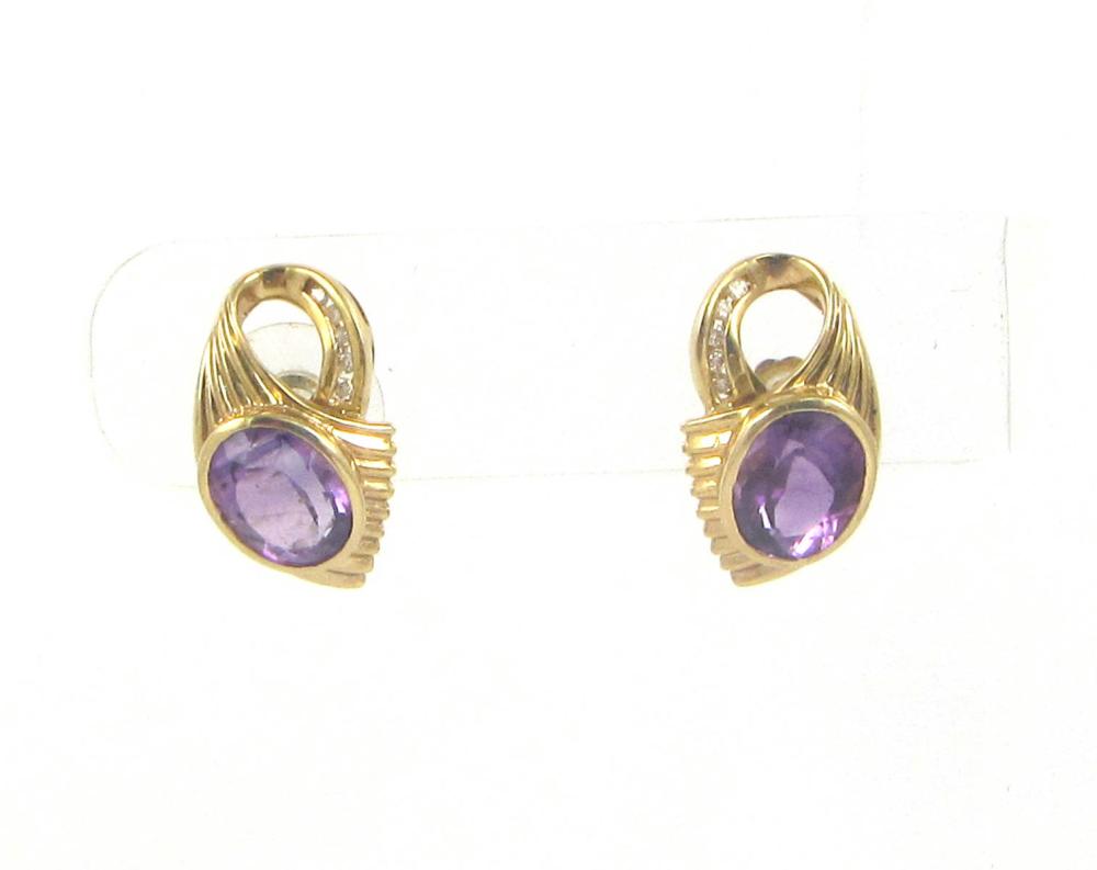 Appraisal: A PAIR OF AMETHYSTS DIAMONDS AND FOURTEEN KARAT GOLD EARRINGS