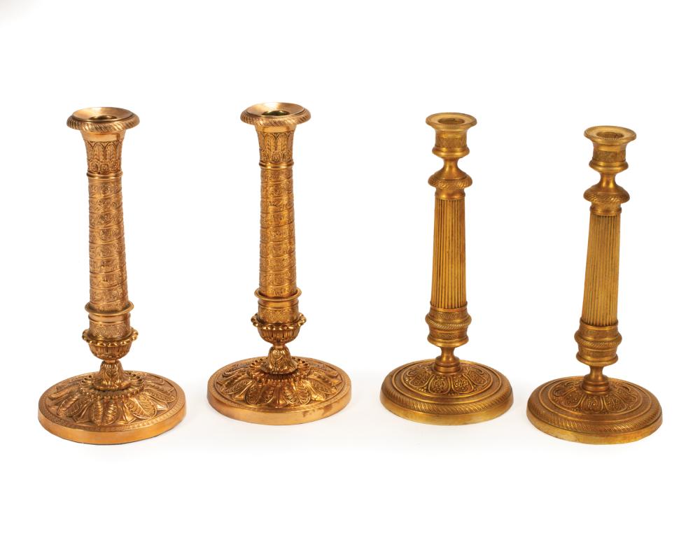 Appraisal: Two Pairs of Charles X Gilt Bronze Candlesticks th c