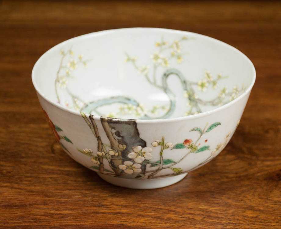 Appraisal: CHINESE QING PORCELAIN BOWL with cross edge blossoming cherry blossom