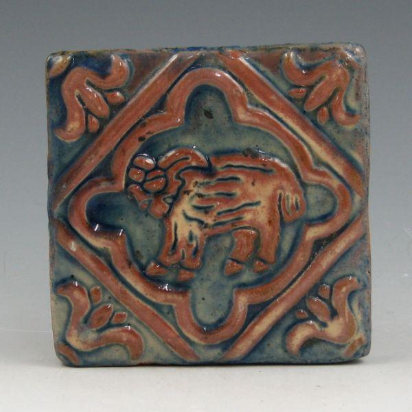 Appraisal: Moravian tile with animal design with blue gloss on red