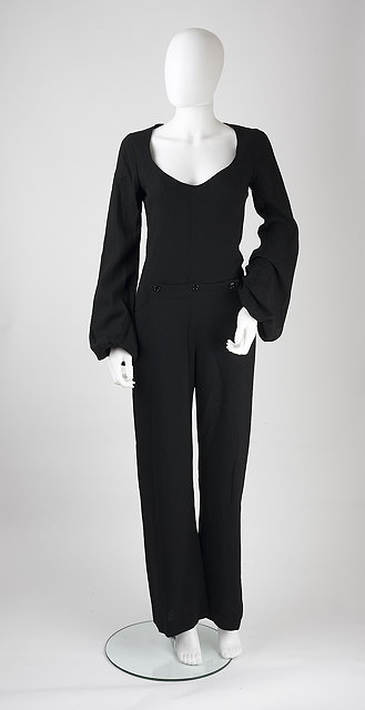 Appraisal: An Alexander McQueen black jump suit deep round neckline pockets