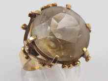 Appraisal: A yellow metal tests ct gold large quartz ring