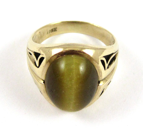 Appraisal: TIGER'S EYE AND TEN KARAT GOLD RING set with a