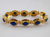 Appraisal: A yellow metal tests carat gold lapis lazuli bracelet lapis