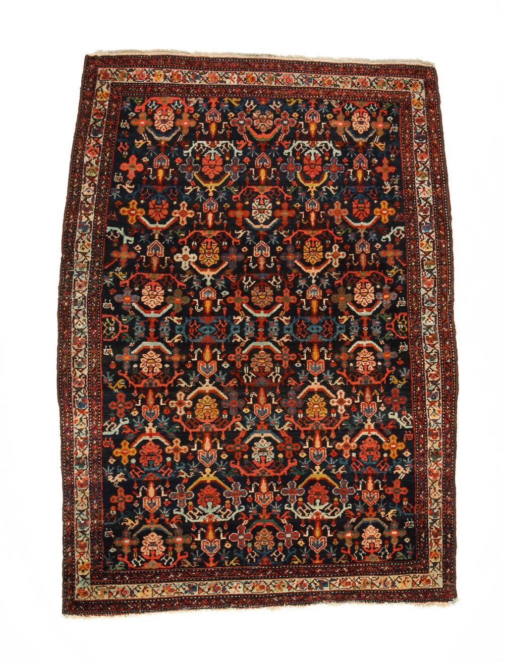 Appraisal: NORTHWEST PERSIAN KURDISH RUG First quarter- th century All-over design