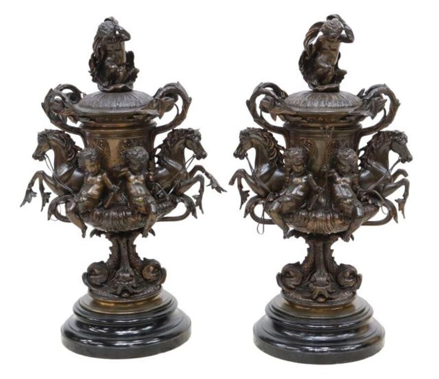 Appraisal: pair Patinated bronze lidded urns finial of putto rising from