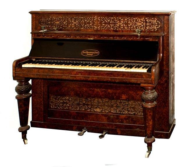 Appraisal: A Victorian walnut upright piano by John Broadwood Sons of