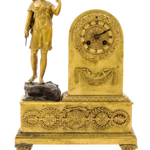 Appraisal: An Empire Gilt Bronze Figural Desk Clock Early th Century