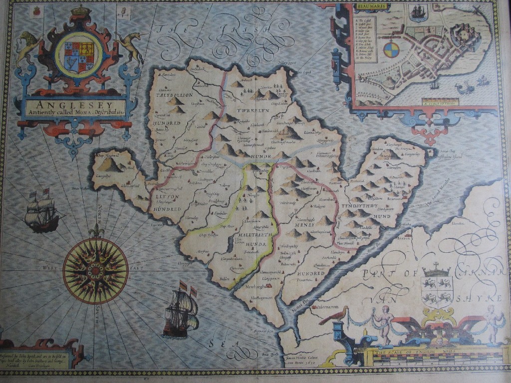 Appraisal: John Speed Anglesey a coloured engraved map with armorial Beaumaris