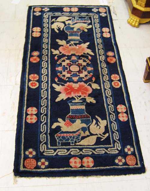 Appraisal: PAOTOU old Blue ground with round central medallion and vases