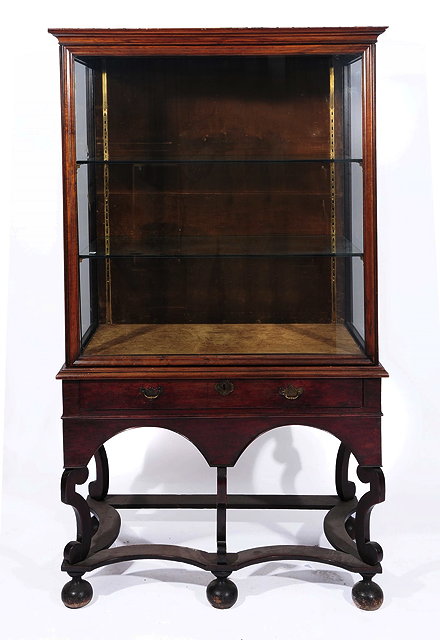 Appraisal: A TH CENTURY STYLE WALNUT COLLECTION CABINET constructed in two