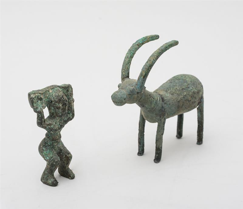 Appraisal: CENTRAL LURISTAN PATINATED METAL ANTELOPE Together with a patinated metal