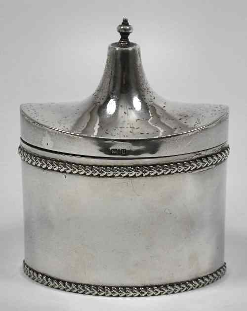 Appraisal: A George V silver oval tea caddy of George III