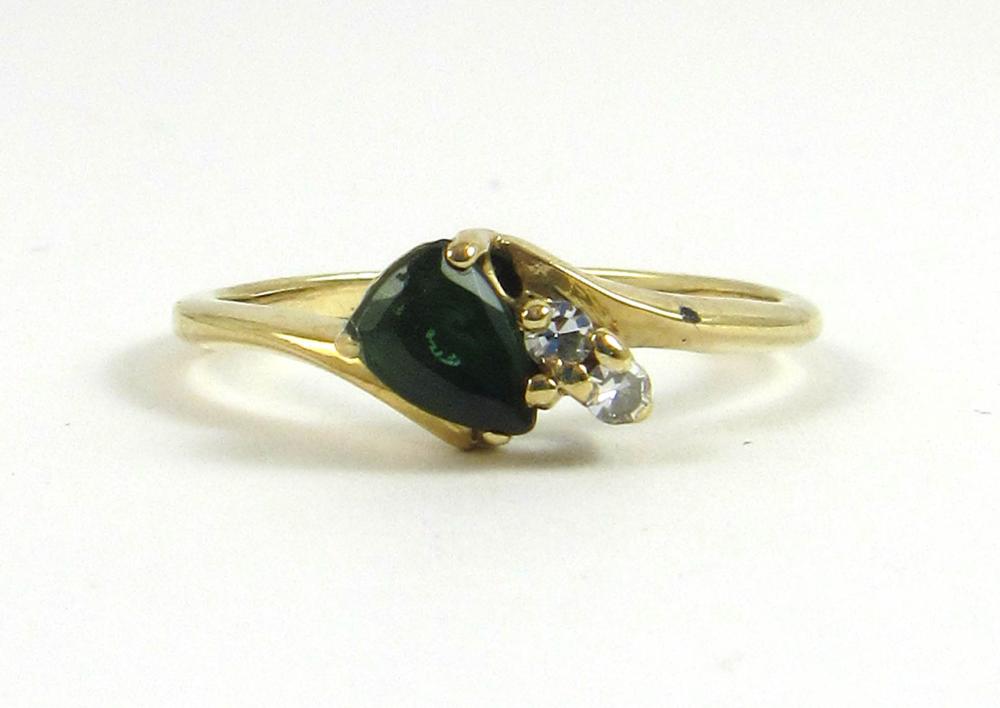 Appraisal: TOURMALINE DIAMOND AND FOURTEEN KARAT GOLD RING The k yellow