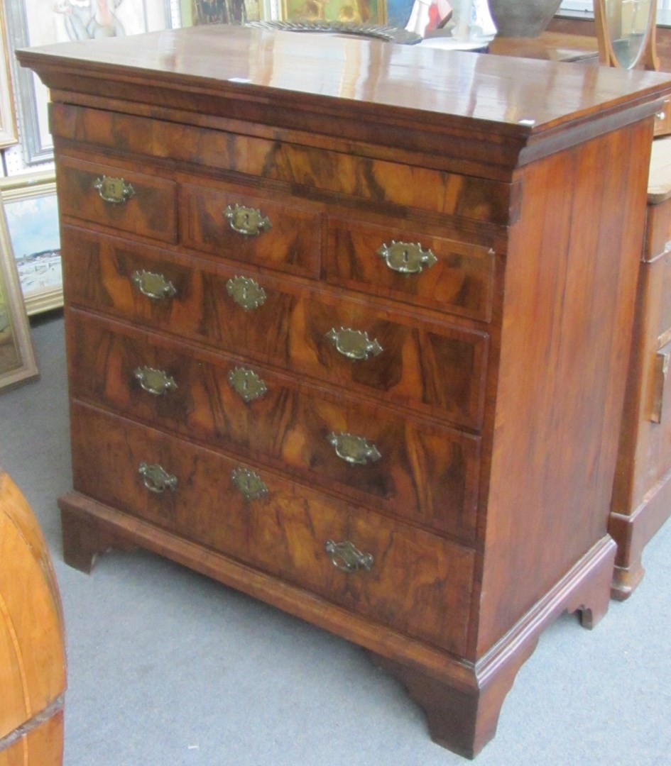 Appraisal: A th century and later figured walnut chest with one