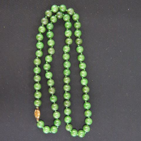 Appraisal: Jade Necklace rich green beads Chinese gold on silver clasp