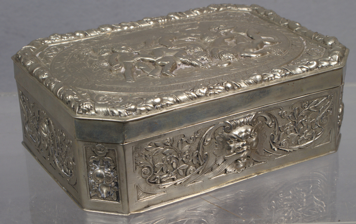 Appraisal: German silver alloy dresser box with mahogany liner cavorting cherubs