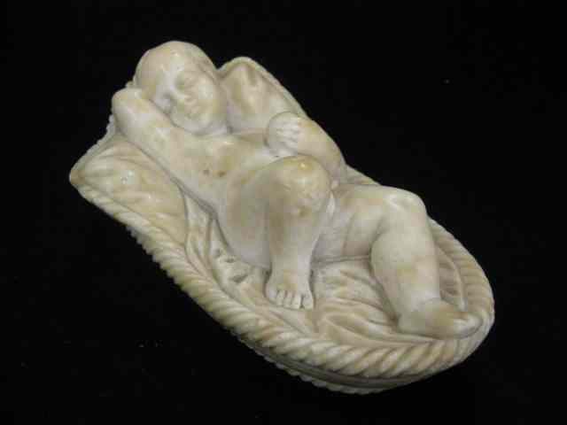 Appraisal: Carved Marble Figurine of a Sleeping Child holding fruit ''