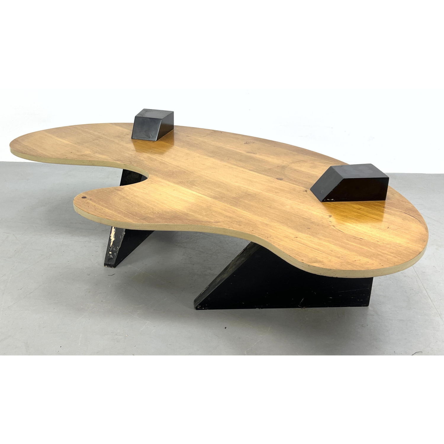 Appraisal: Modernist Biomorphic Wood Cocktail Coffee Table Ebonized base pedestals with