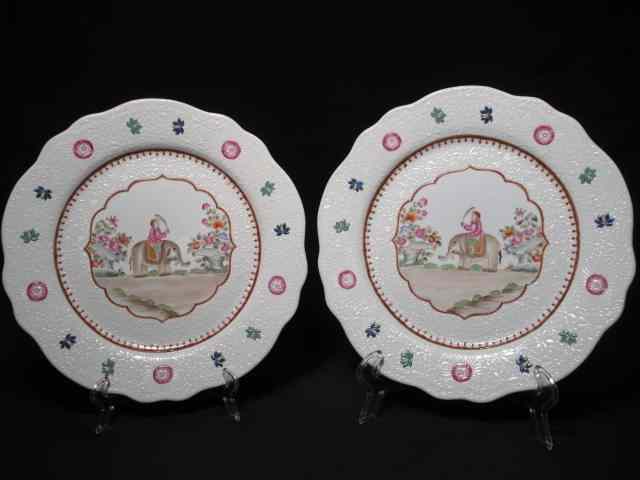 Appraisal: Pair of Chelsea House porcelain charger plates Painted with man