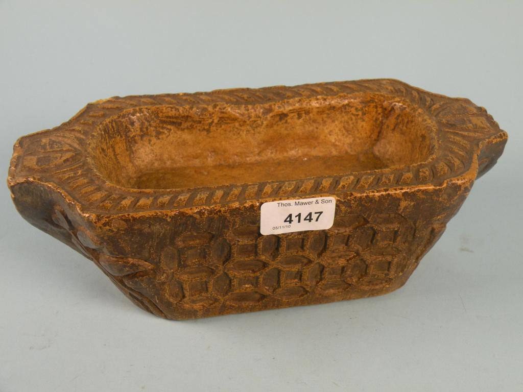 Appraisal: A Continental stone trough decorated with a lattice type design