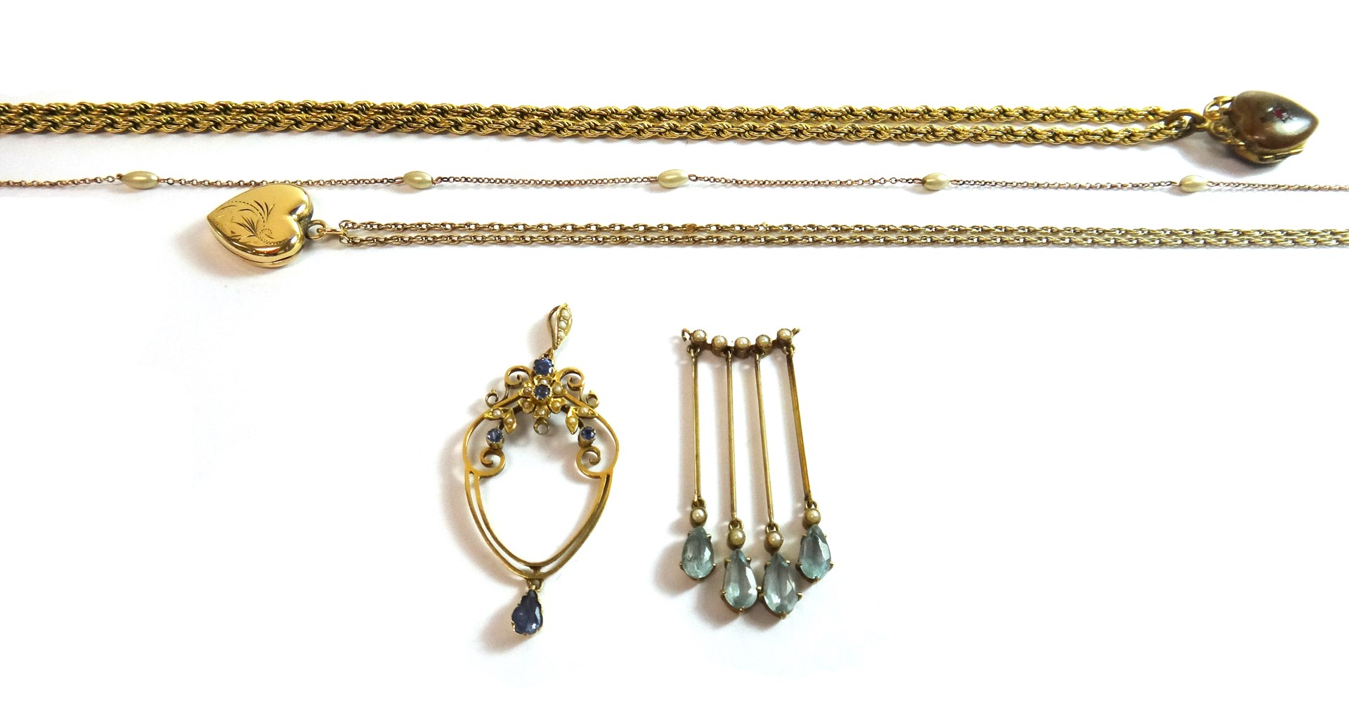 Appraisal: A gold sapphire and seed pearl set pendant a gold