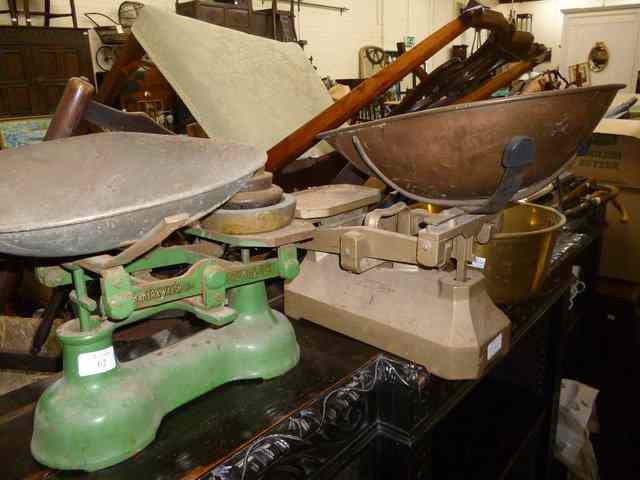 Appraisal: TWO PAIRS OF CAST IRON KITCHEN SCALES together with a