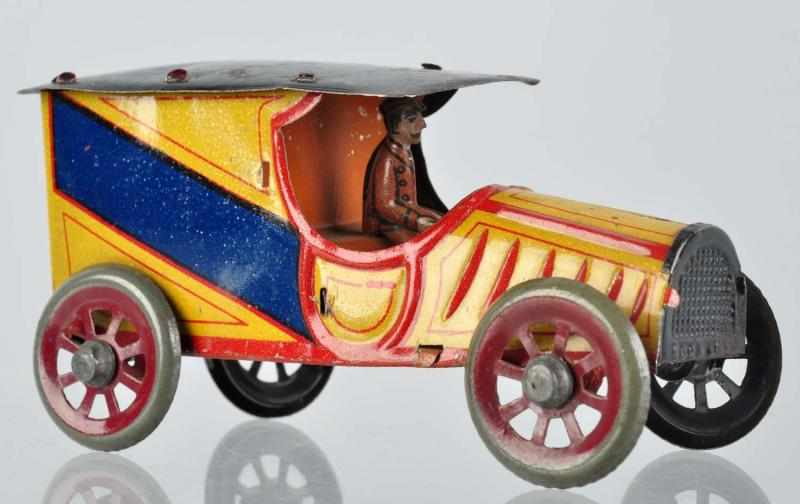 Appraisal: Tin Litho Truck Penny Toy German Tin litho driver Nice