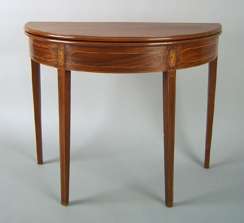 Appraisal: Federal mahogany card table ca the demilune top over a