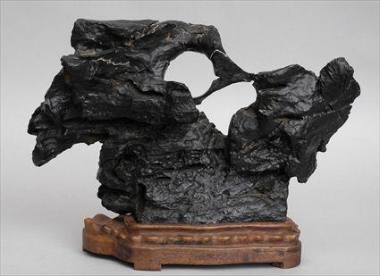 Appraisal: CHINESE VEINED BLACK STONE SCHOLAR'S ROCK Of natural eroded and