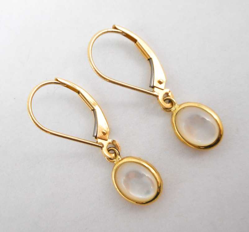 Appraisal: PAIR OF MOTHER-OF-PEARL DANGLE EARRINGS each k yellow gold with