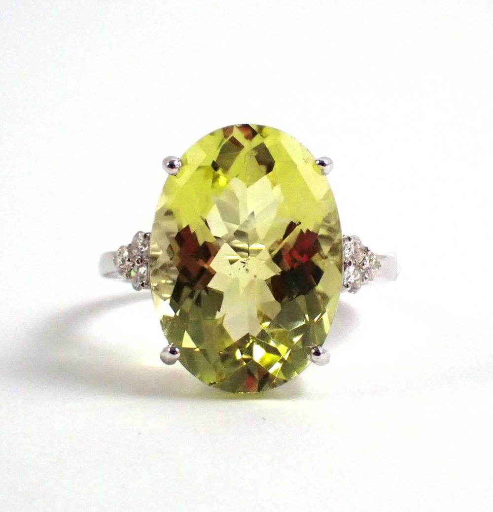 Appraisal: LEMON CITRINE DIAMOND AND FOURTEEN KARAT GOLD RING The k