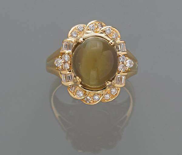 Appraisal: A cat s eye chrysoberyl and diamond ring chrysoberyl weighing