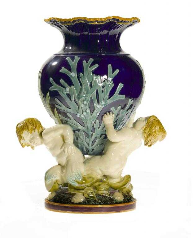 Appraisal: A MINTONS MAJOLICA MARINE OR TRITON VASE with shell neck