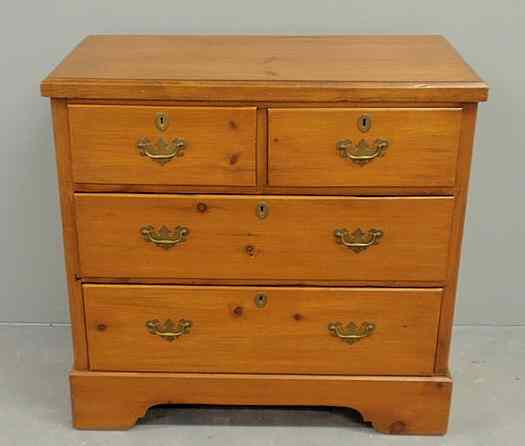 Appraisal: Pine Chippendale style chest of drawers with a two-over-two drawer