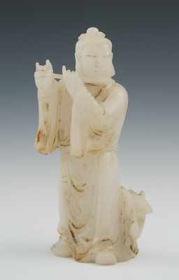 Appraisal: A Carved White Jade Figure of a Flute Player Apprx