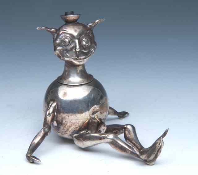 Appraisal: A NOVELTY SILVER SPIRIT BURNER in the form of a