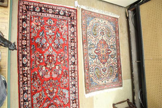 Appraisal: TWO ORIENTAL RUGS A runner with red ground and foliate