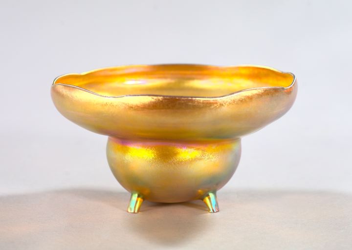 Appraisal: L C Tiffany Gold Iridized Favrile Glass Quatrepodal Bowl first