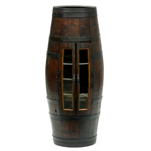 Appraisal: An oak barrel cabinet with iron coopered bands pair of