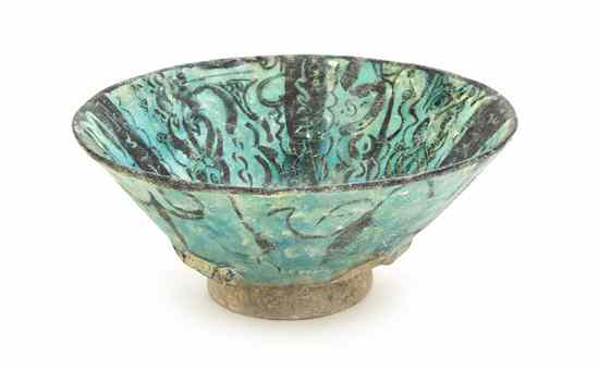 Appraisal: A Middle Eastern Turquoise Glazed Pottery Bowl with central medallion