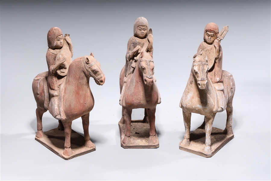 Appraisal: Group of three Chinese Tang-style pottery figures of musicians on